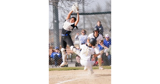 MCC’s Laila Gutierrez leaps high for a throw to home plate but NJC scored twice in the sixth inning of Game 2 to take the lead and go on to a Monday sweep over MCC.